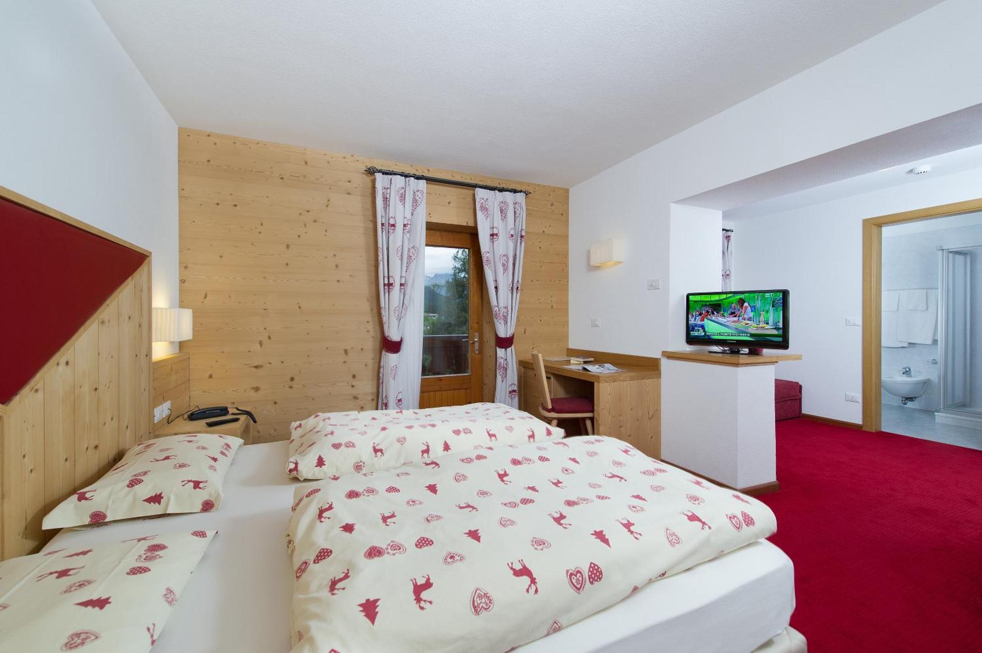Hotel Gran Mugon Vigo di Fassa Camera foto